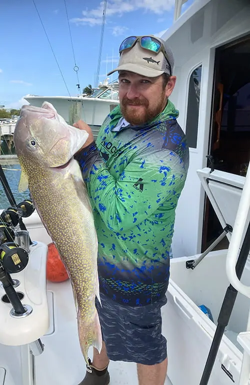 Captain Nick Meyer posing on his boat